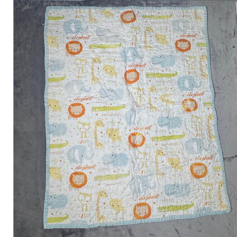 Handmade baby crib quilt 26" x 35" , unisex lions, aligators,‎ flowers pastels
